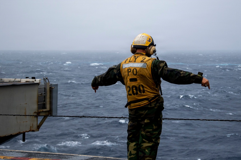 Abraham Lincoln conducts a replenishment-at-sea with Cesar Chavez