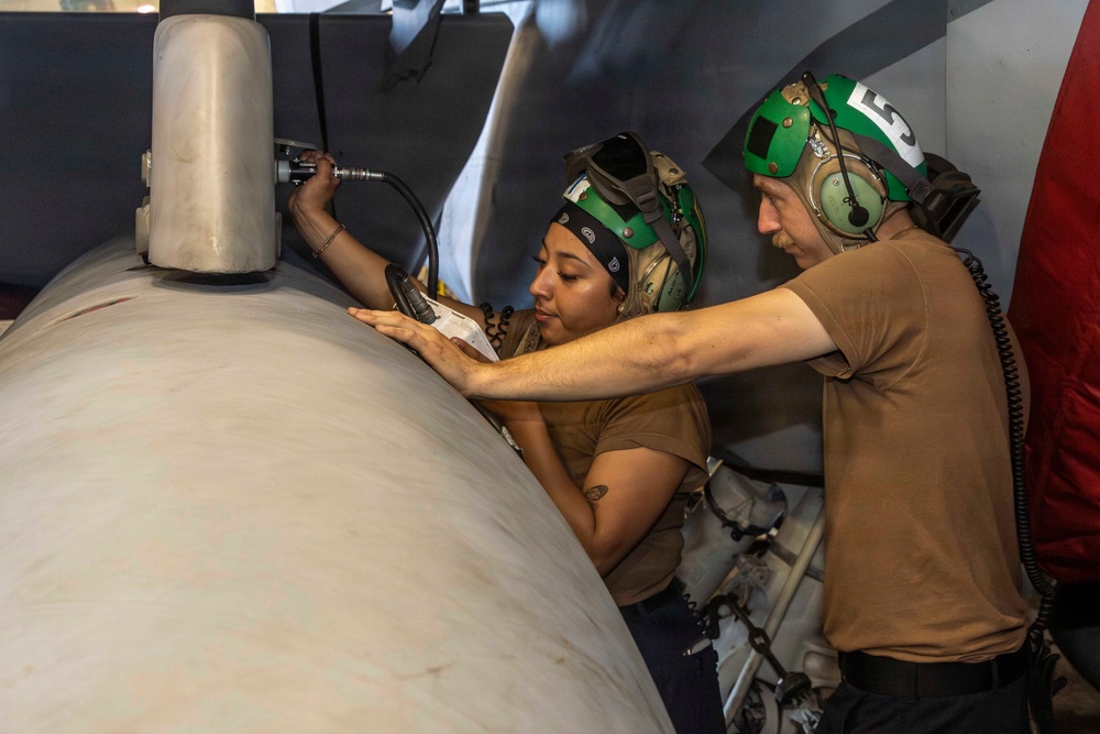 Abraham Lincoln conducts routine aircraft maintenance
