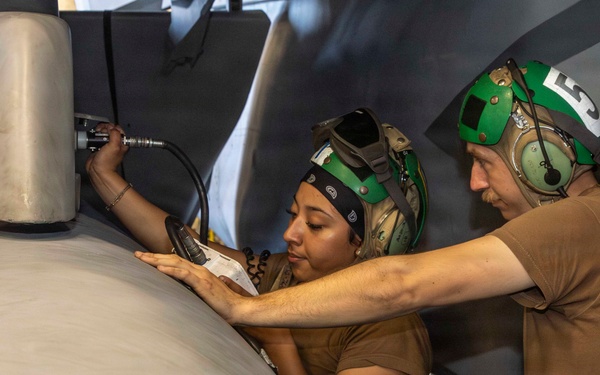 Abraham Lincoln conducts routine aircraft maintenance