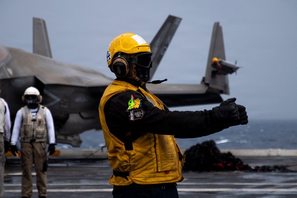 Abraham Lincoln conducts a replenishment-at-sea with Cesar Chavez