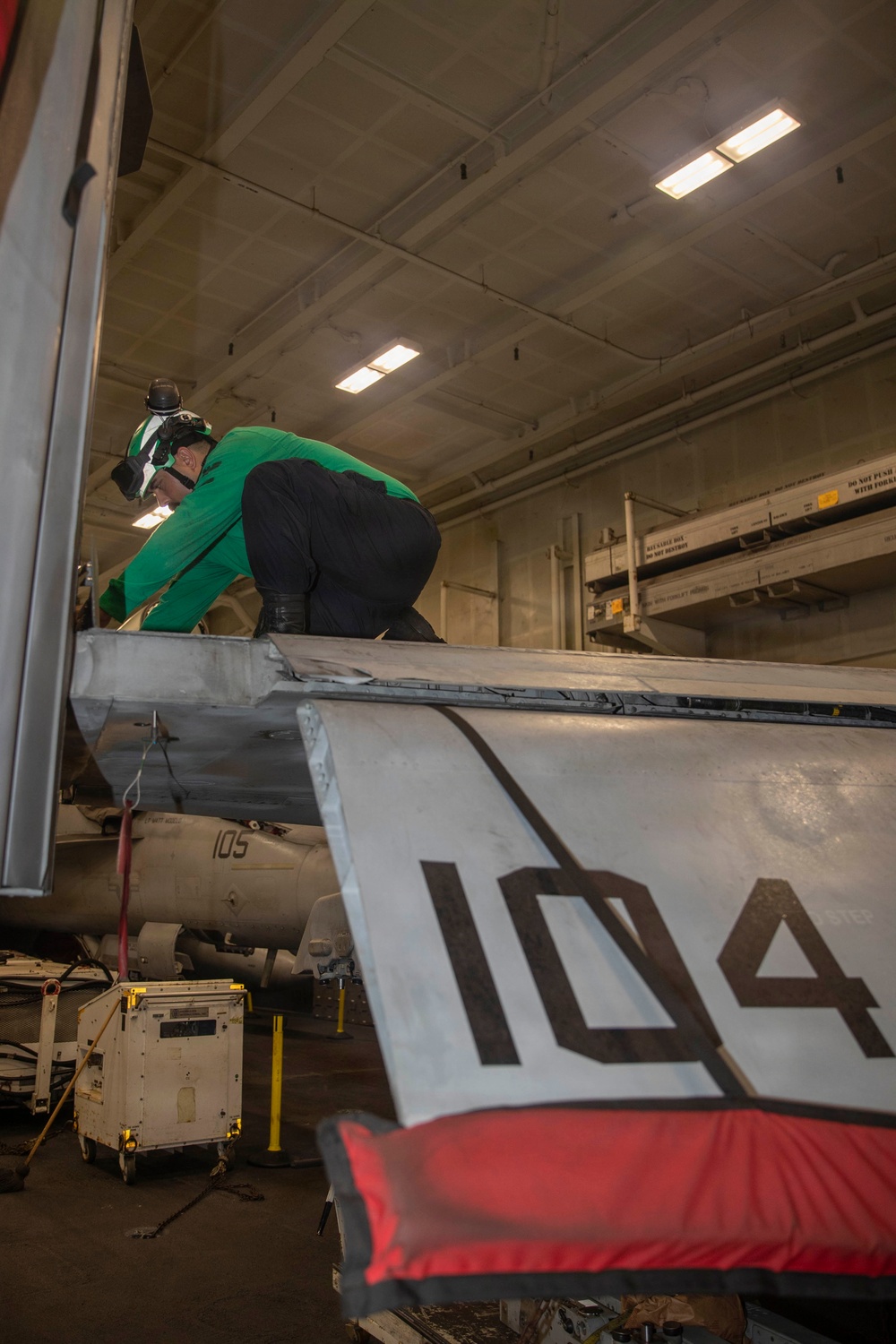 Abraham Lincoln conducts routine aircraft maintenance