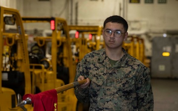 Marine Corps conduct drill training aboard Abraham Lincoln