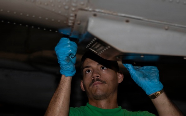 Abraham Lincoln conducts routine aircraft maintenance