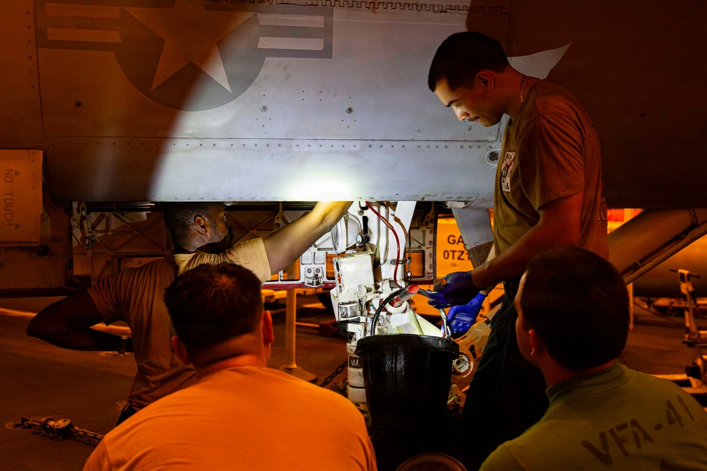 Abraham Lincoln conducts routine aircraft maintenance