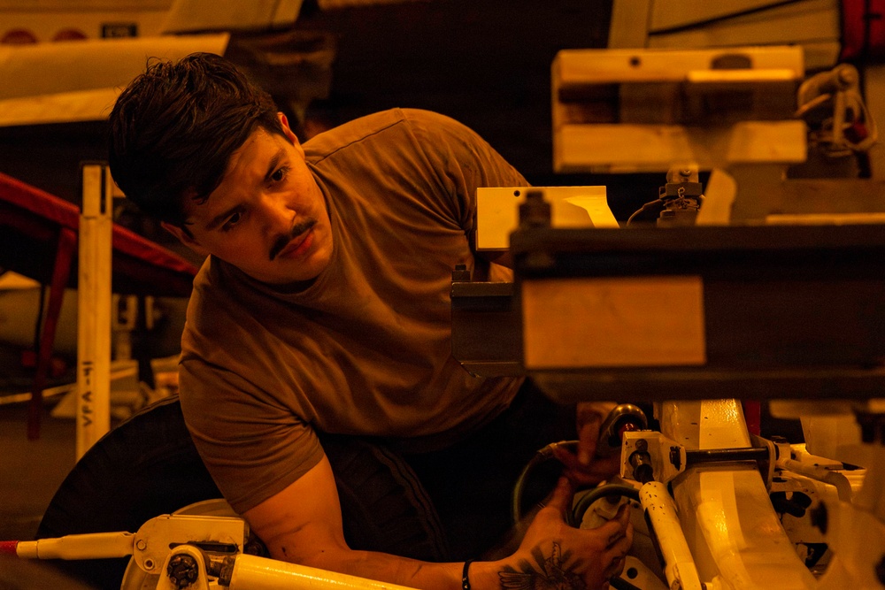 Abraham Lincoln conducts routine aircraft maintenance