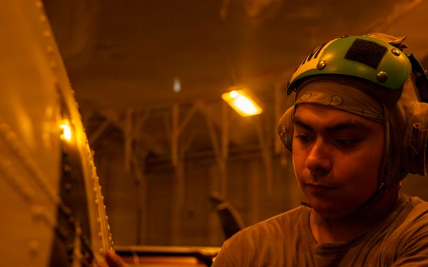 Abraham Lincoln conducts routine aircraft maintenance