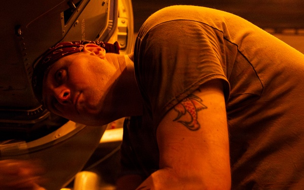 Abraham Lincoln conducts routine aircraft maintenance