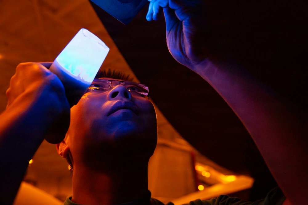 Abraham Lincoln conducts routine aircraft maintenance