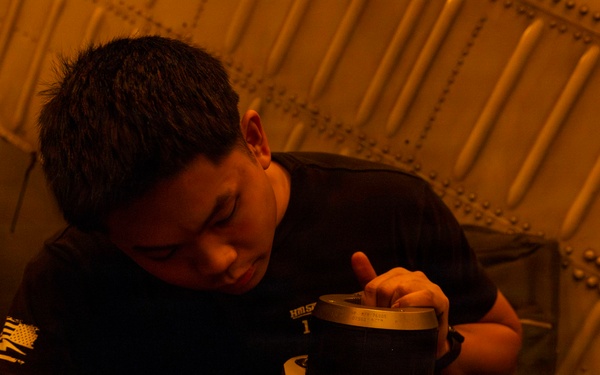 Abraham Lincoln conducts routine aircraft maintenance