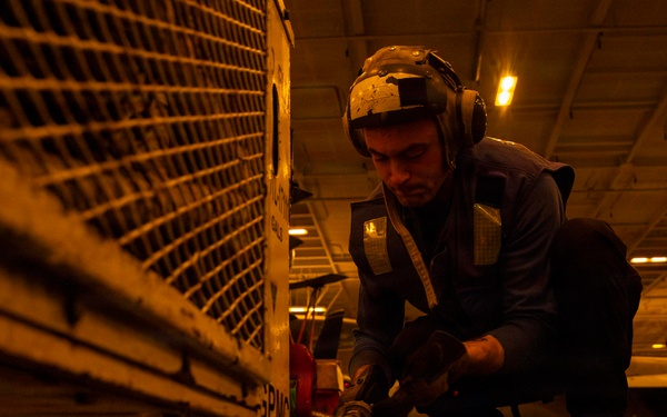 Abraham Lincoln conducts routine aircraft maintenance