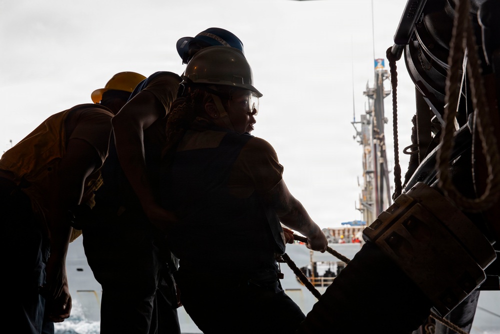 Abraham Lincoln conducts a fueling-at-sea with Henry J. Kaiser