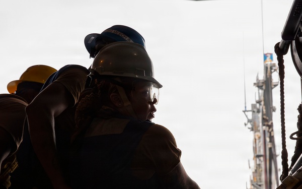 Abraham Lincoln conducts a fueling-at-sea with Henry J. Kaiser