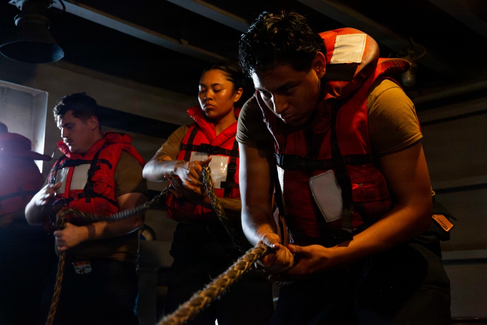 Abraham Lincoln conducts a fueling-at-sea with Henry J. Kaiser