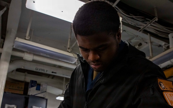 Abraham Lincoln conducts routine maintenance