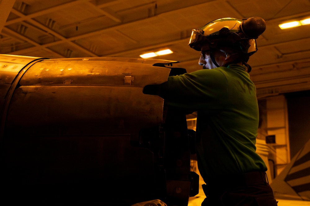 Abraham Lincoln conducts routine aircraft maintenance