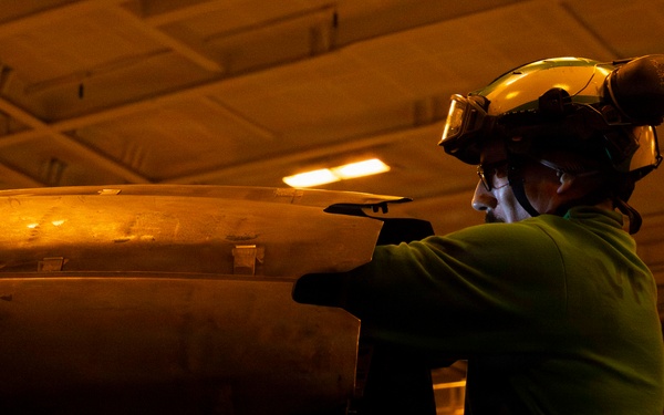 Abraham Lincoln conducts routine aircraft maintenance