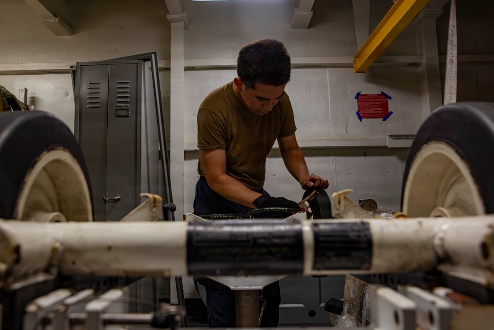 Abraham Lincoln conducts routine maintenance