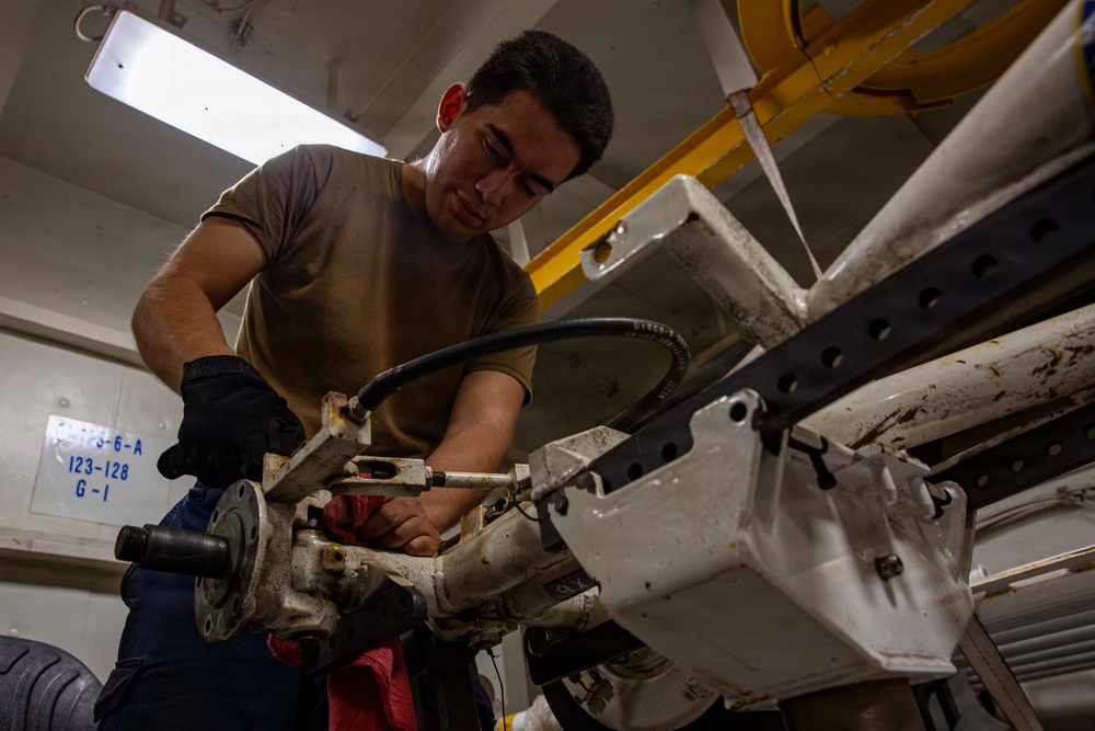 Abraham Lincoln conducts routine maintenance