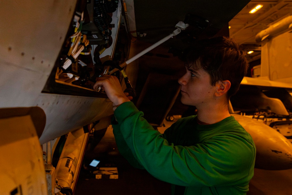 Abraham Lincoln conducts routine aircraft maintenance