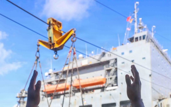 USS Lake Erie (CG 70) conducts a replenishment-at-sea with USNS Robert E. Peary (T-AKE-5)
