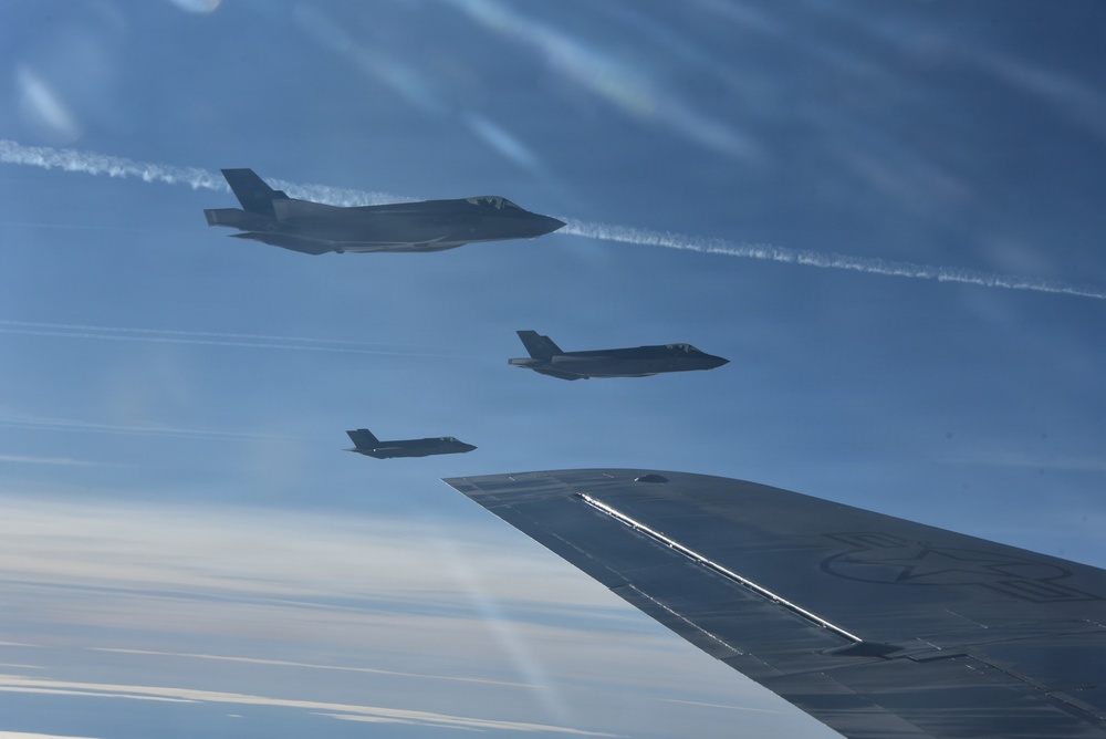F-35A Lightning II depart after refueling