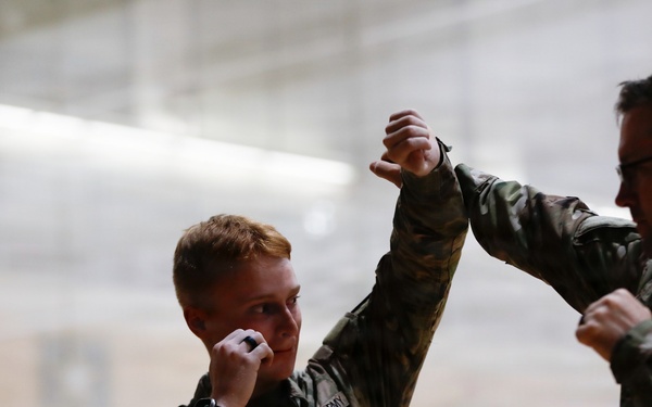 1st Signal Brigade soldiers take a Taekwondo yellow belt promotion test