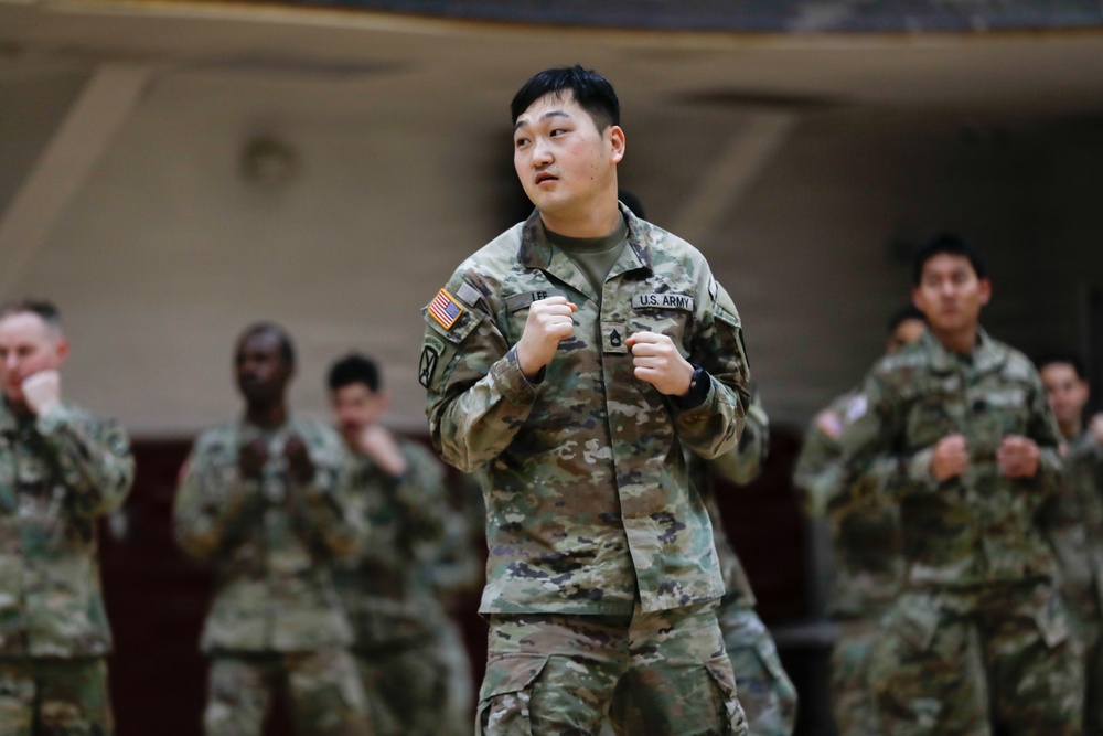 1st Signal Brigade soldiers take a Taekwondo yellow belt promotion test