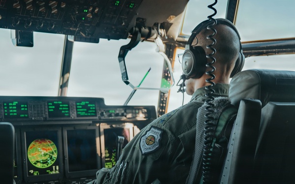 Gen. Spain leads from the cockpit during HC-130J flight at Nellis AFB