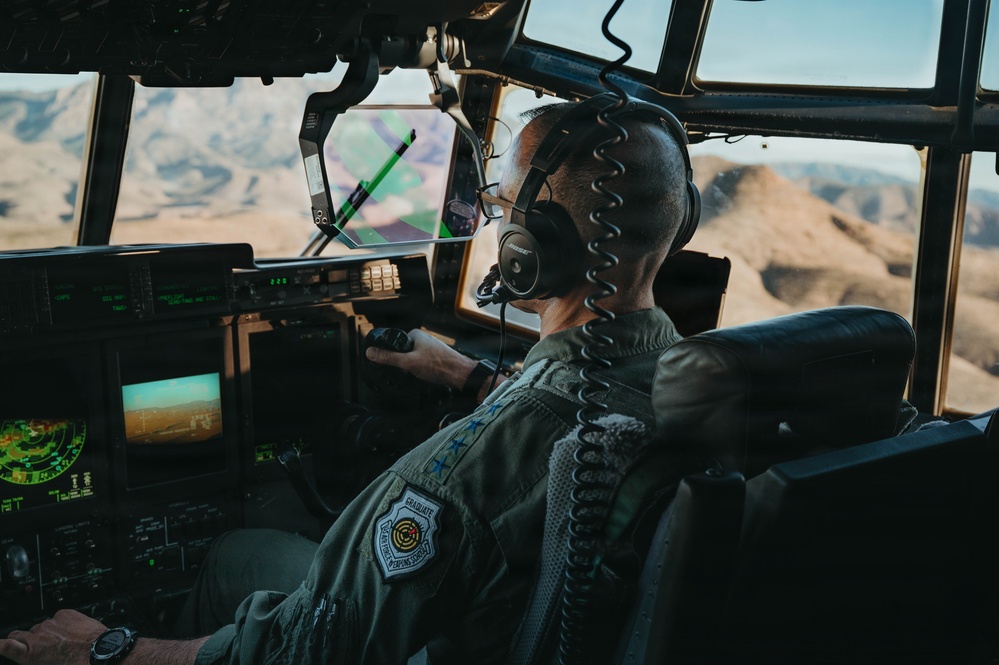 Gen. Spain leads from the cockpit during HC-130J flight at Nellis AFB