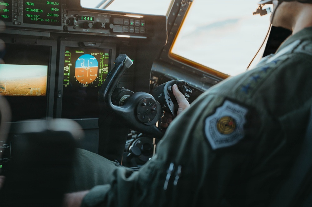 Gen. Spain leads from the cockpit during HC-130J flight at Nellis AFB