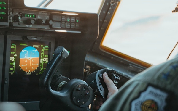 Gen. Spain leads from the cockpit during HC-130J flight at Nellis AFB