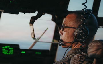 Gen. Spain leads from the cockpit during HC-130J flight at Nellis AFB