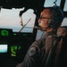 Gen. Spain leads from the cockpit during HC-130J flight at Nellis AFB