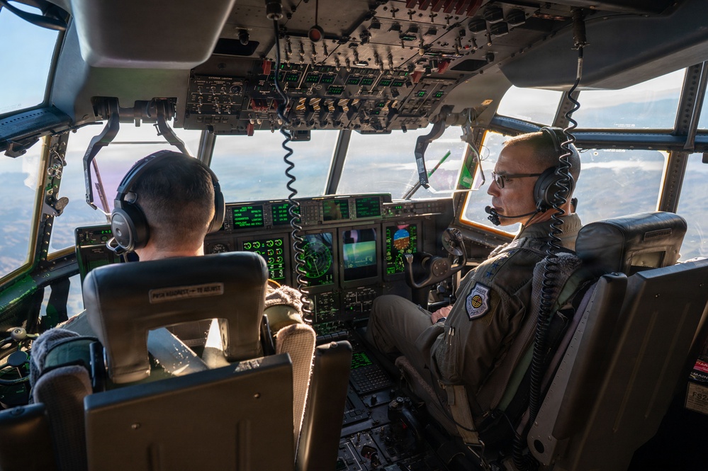 Gen. Spain leads from the cockpit during HC-130J flight at Nellis AFB