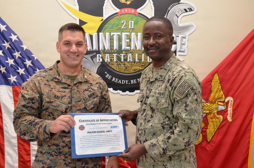Armed Services Blood Program Presents Certificate of Appreciation to 2nd Maintenance Battalion Operations Officer