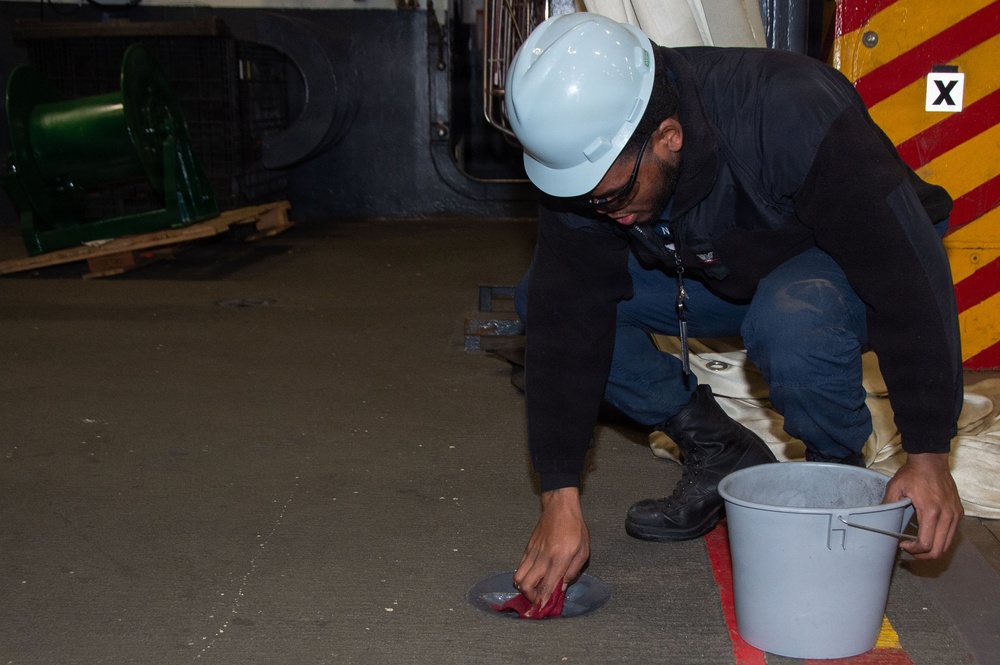 Ronald Reagan Sailors and Contractors Perform Maintenance