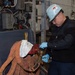 Ronald Reagan Sailors and Contractors Perform Maintenance