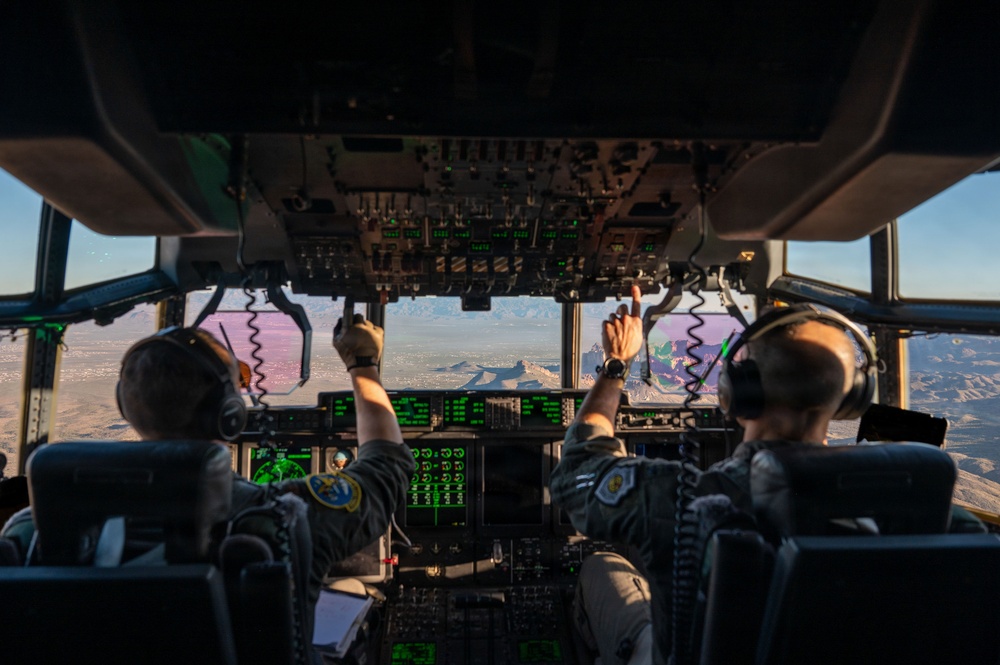 Gen. Spain leads from the cockpit during HC-130J flight at Nellis AFB