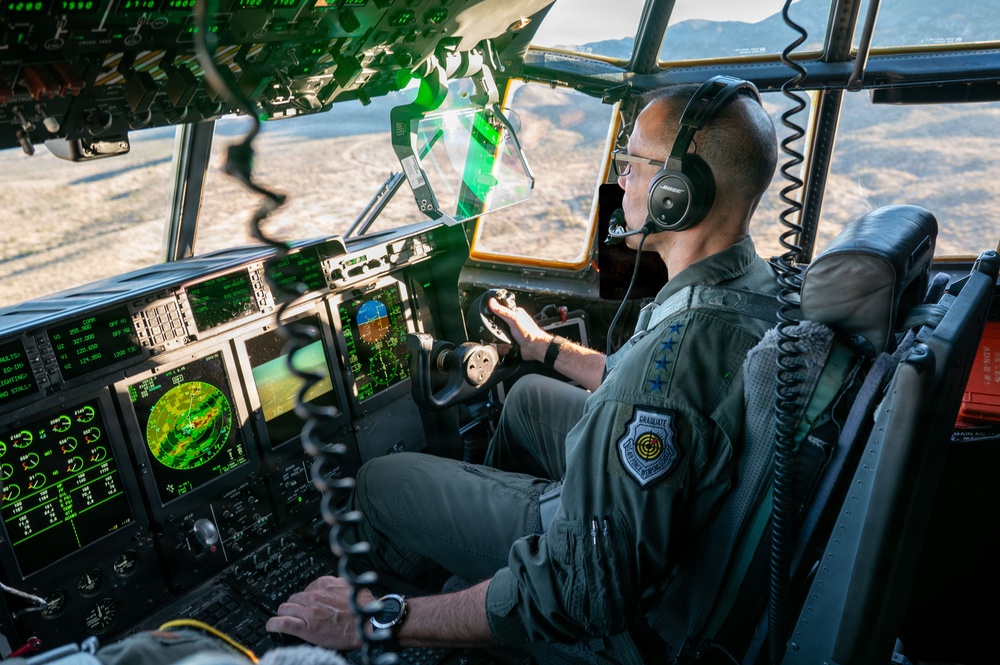 Gen. Spain leads from the cockpit during HC-130J flight at Nellis AFB