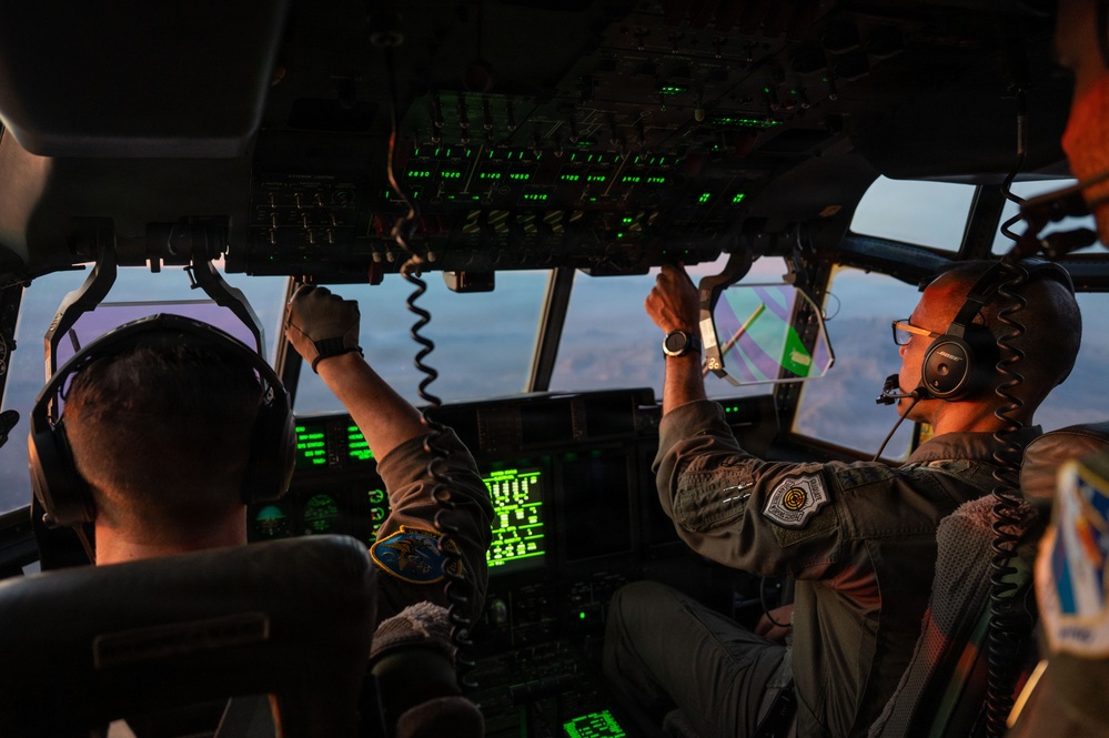 Gen. Spain leads from the cockpit during HC-130J flight at Nellis AFB