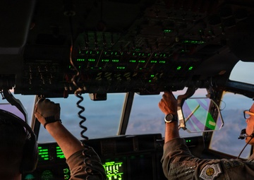 Gen. Spain leads from the cockpit during HC-130J flight at Nellis AFB