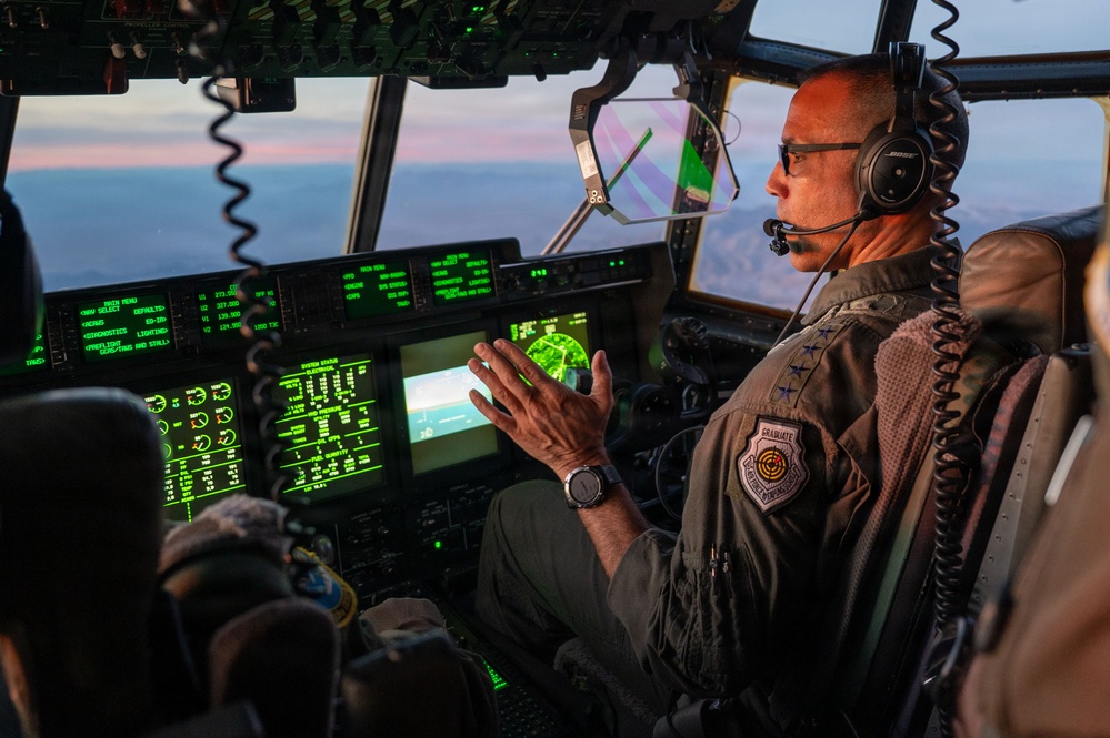 Gen. Spain leads from the cockpit during HC-130J flight at Nellis AFB