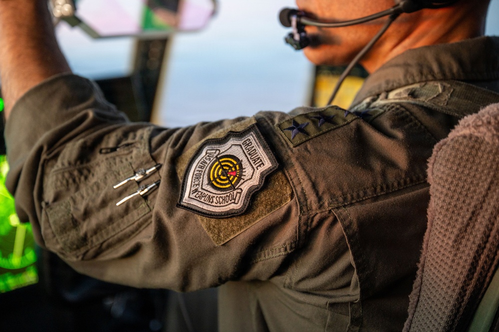Gen. Spain leads from the cockpit during HC-130J flight at Nellis AFB