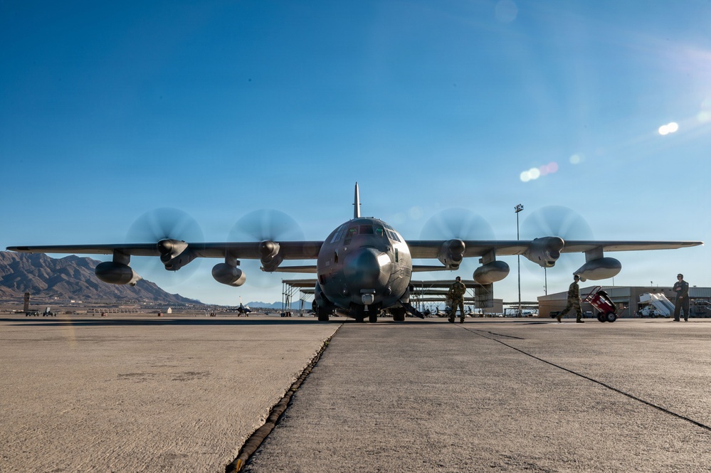 Gen. Spain leads from the cockpit during HC-130J flight at Nellis AFB