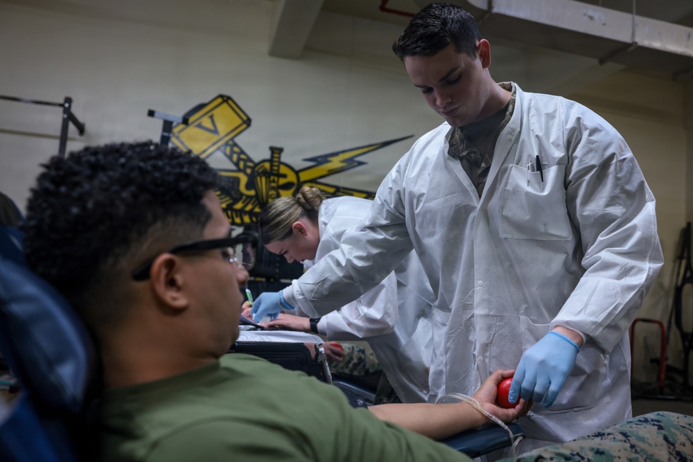 U.S. Marines volunteer at Camp Hansen Blood Drive