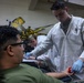 U.S. Marines volunteer at Camp Hansen Blood Drive