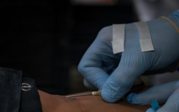 U.S. Marines volunteer at Camp Hansen Blood Drive