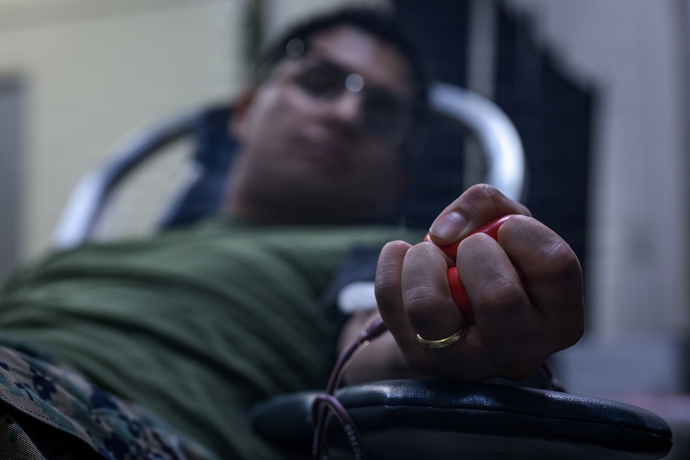 U.S. Marines volunteer at Camp Hansen Blood Drive