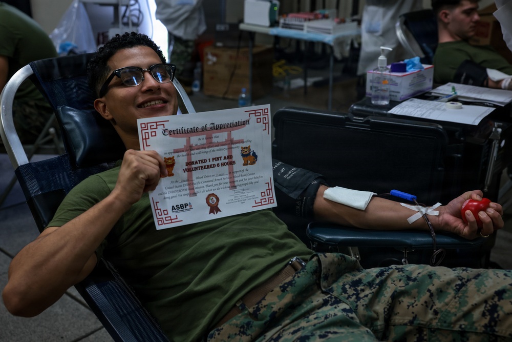 U.S. Marines volunteer at Camp Hansen Blood Drive