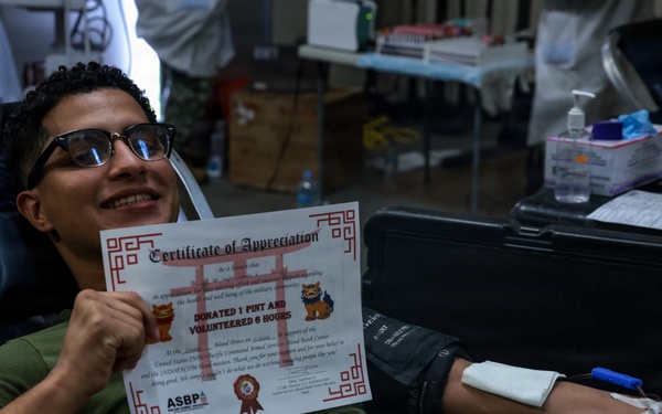 U.S. Marines volunteer at Camp Hansen Blood Drive